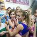 Six-year-old Faith Falzon and the level nine team watches gymnastic flips on Monday, Jan. 28. Daniel Brenner I AnnArbor.com